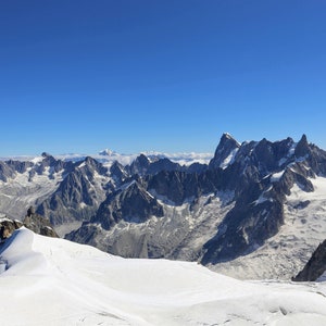 Clear view of snowy mountains in Mont Blanc. Downloadable Full Color Wall Art Print.