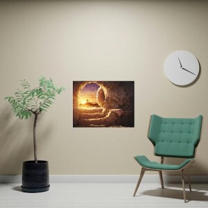 May include: A painting depicting a stone tomb with a large opening, revealing a bright light and a cross in the distance. The tomb is made of rough-hewn stone and is set against a backdrop of a golden sky.