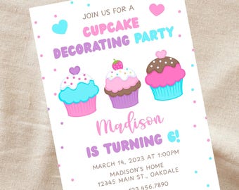 May include: A pink and blue cupcake decorating party invitation with three cupcakes and the text "JOIN US FOR A CUPCAKE DECORATING PARTY. Madison IS TURNING 6! MARCH 14, 2023 AT 1:00PM MADISON'S HOME 12345 MAIN ST., OAKDALE RSVP: 123.456.7890"