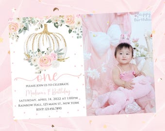 May include: A pink and gold first birthday invitation with a pumpkin design and floral accents. The invitation includes the text "one" and details for the celebration. A photo of a baby in a pink dress and a plush toy is also included.
