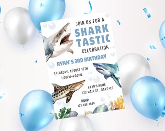 May include: A blue and white birthday invitation with a shark theme. The invitation says "Join us for a Shark Tastic Celebration. Ryan's 3rd Birthday. Saturday, August 12th 1:00PM-4:00PM. Ryan's Home 123 Main St., Oakdale. RSVP 123-456-7890".