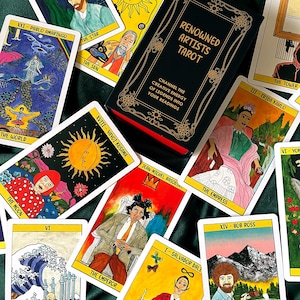 May include: A tarot deck with the title "Renowned Artists Tarot" and the text "Channel the creative energy of legends into your readings." The cards feature illustrations of famous artists like Frida Kahlo and Bob Ross.