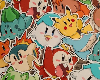 May include: A collection of colorful cartoon character stickers featuring various Pokemon characters, including Pikachu, Squirtle, Bulbasaur, Charmander, and others. The stickers are printed on white paper and have a glossy finish.