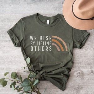 We Rise By Lifting Others Graphic Tee