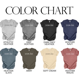 May include: Color chart showing 10 different t-shirt colors. The colors are: Athletic Heather, Deep Heather, Dark Grey Heather, Heather Navy, Heather Slate, Army, Soft Cream, Heather Mauve. Each color has a t-shirt with the text "stay weird." printed on it.