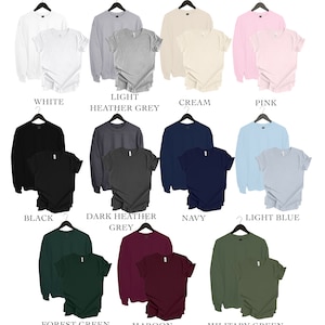 May include: A set of 12 different colour combinations of long-sleeved sweatshirts and short-sleeved t-shirts. The colours include white, light heather grey, cream, pink, black, dark heather grey, navy, light blue, forest green, maroon, and military green.