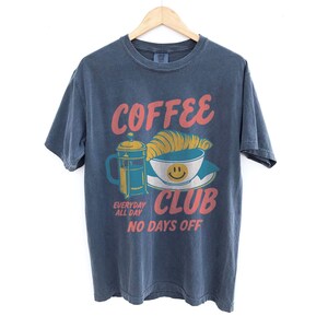 Coffee Club T-Shirt – Retro Coffee Lover Graphic Tee with Croissant And French Press – Cozy Aesthetic Gift Denim