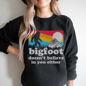 Bigfoot Doesn't Believe In You Either Crewneck Sweatshirt, Unisex Funny Sasquatch Sweatshirt Black