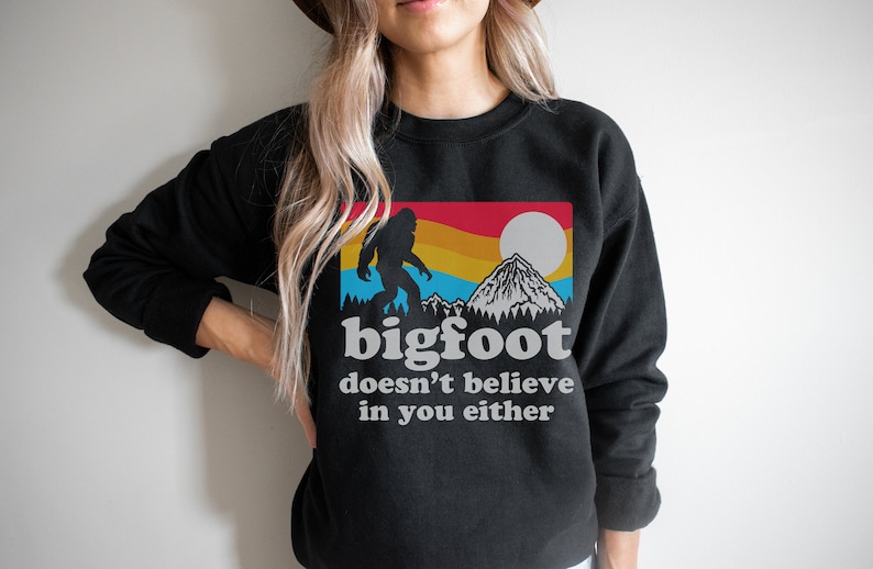 Bigfoot Doesn't Believe In You Either Crewneck Sweatshirt, Unisex Funny Sasquatch Sweatshirt Black