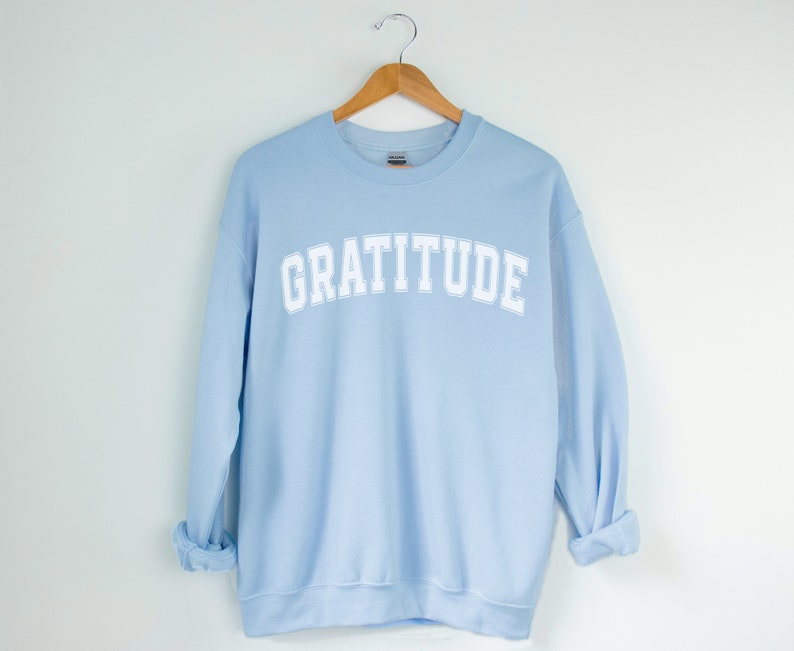 Gratitude Crewneck Sweatshirt, Cute Inspirational Varsity Vibe Sweatshirt Light Blue