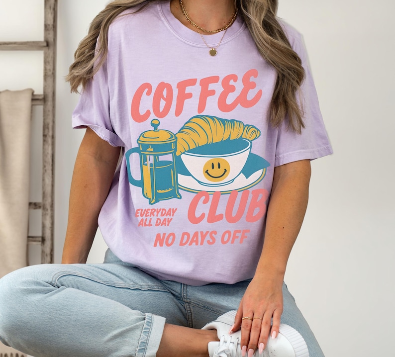 Coffee Club T-Shirt – Retro Coffee Lover Graphic Tee with Croissant And French Press – Cozy Aesthetic Gift Orchid