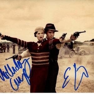 Holliday Grainger y Emile Hirsch firmaron una foto autografiada de Bonnie y Clyde