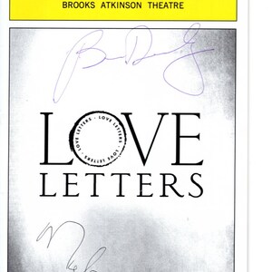 May include: A Playbill from the Brooks Atkinson Theatre with the title "LOVE LETTERS" in large black letters. The Playbill has signatures in purple ink above and below the title. The top of the Playbill is yellow with the word "PLAYBILL" in black.