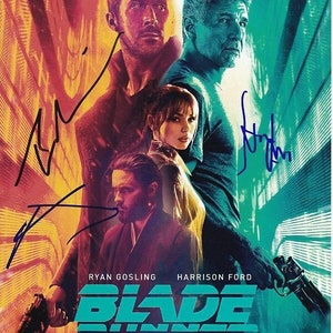 May include: A movie poster for Blade Runner 2049 featuring Ryan Gosling and Harrison Ford. The poster has a red and blue color scheme with the title in a teal color. The actors' names are listed below the title.