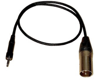 May include: Black cable with a 3.5mm jack on one end and a gold-colored XLR connector on the other end.