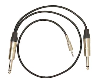 May include: A black braided cable with two 1/4 inch mono plugs. One plug is labeled "REMOX".