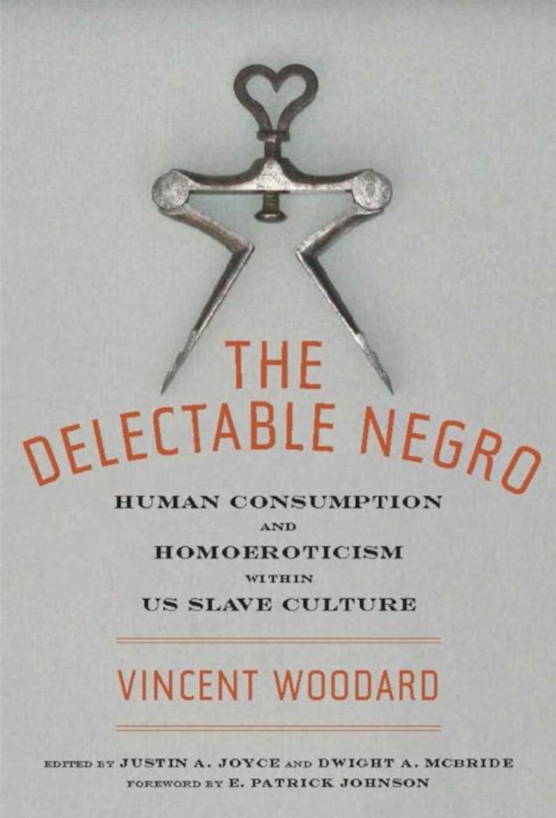 May include: Book cover with the title "THE DELECTABLE NEGRO" in orange letters. The cover features a vintage metal tool with a heart-shaped handle. The book's subtitle reads "HUMAN CONSUMPTION AND HOMOEROTICISM WITHIN US SLAVE CULTURE."