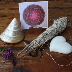 Wood stand and crystal holding an Intention Portal Card in an alter setting!