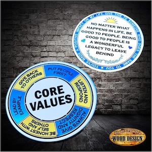 May include: Two round wooden plaques with inspirational quotes and core values. One plaque reads "No matter what happens in life, be good to people." The other says "Core Values" with related principles.