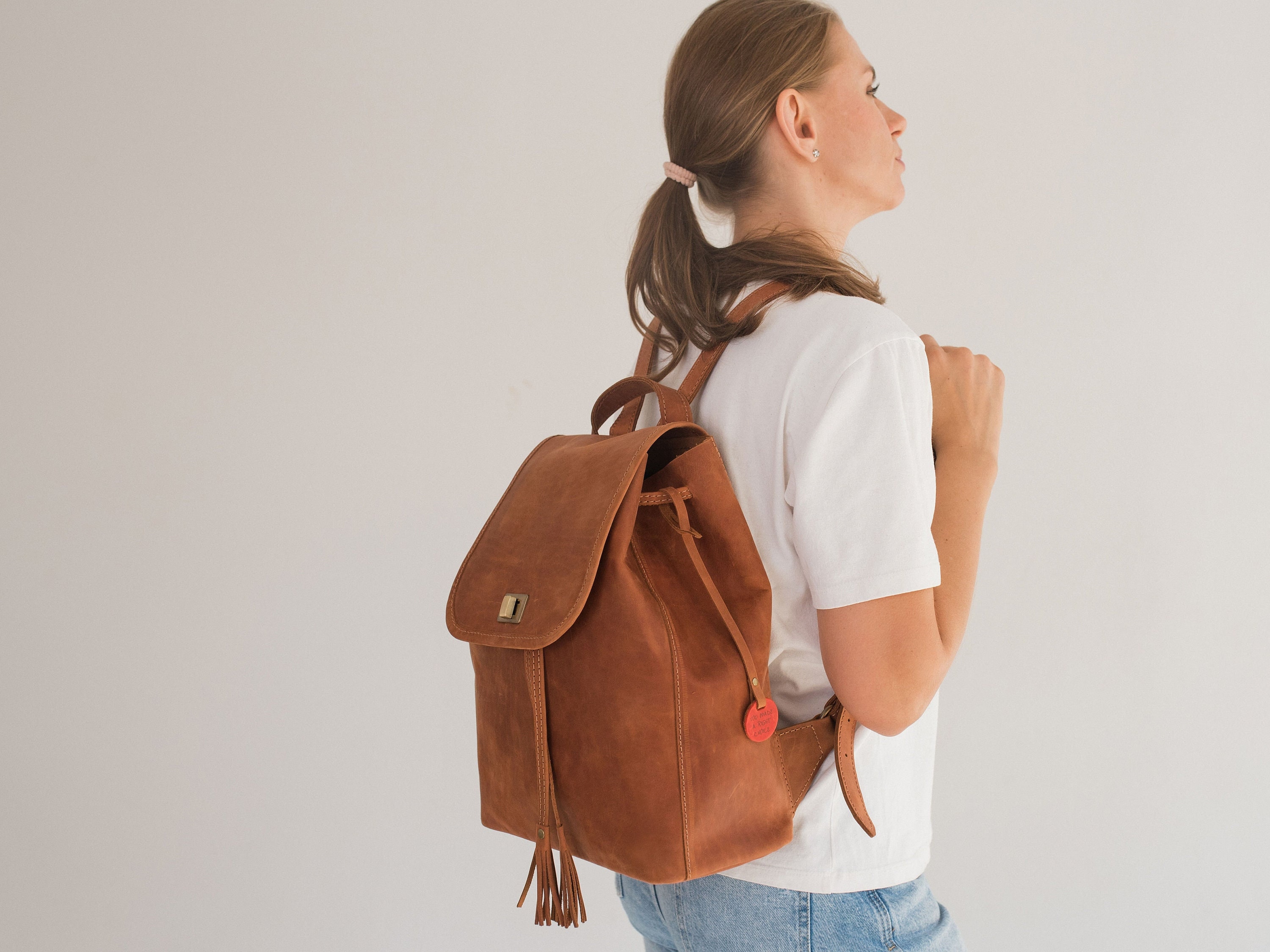 Leather string backpack discount