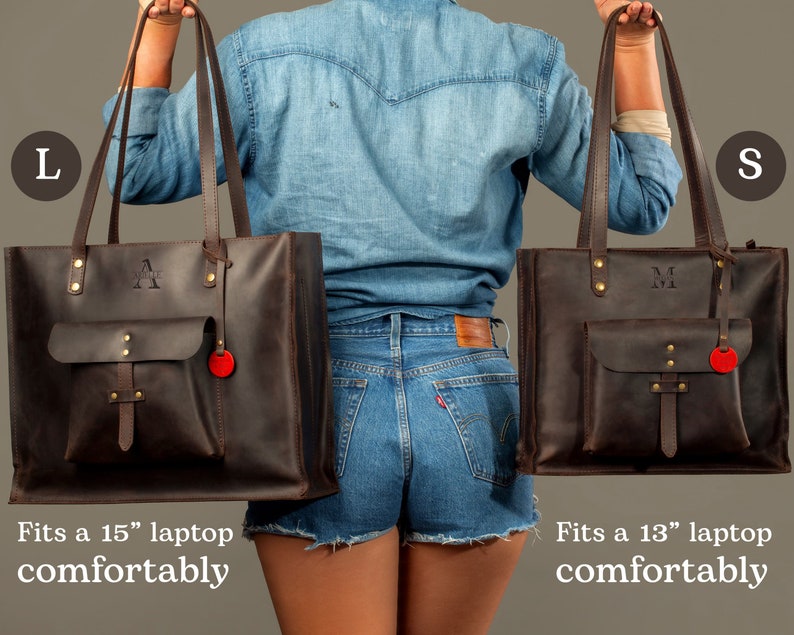May include: Two brown leather tote bags, one large and one small, with long handles. The large bag has the letter "A" and the small bag has the letter "M" embossed on them. Each bag has a front pocket and a red tag. The large bag fits a 15" laptop comfortably, and the small bag fits a 13" laptop comfortably.