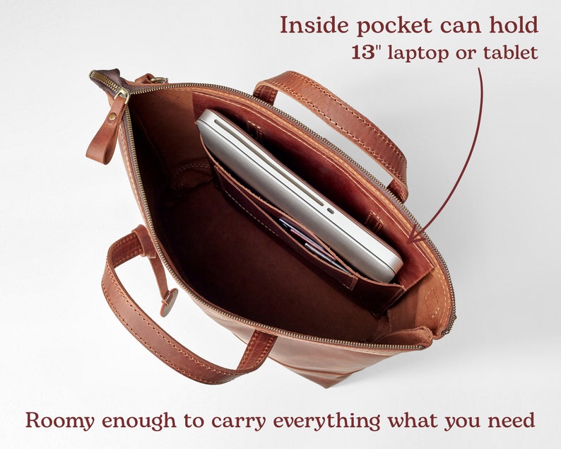 May include: A brown leather tote bag with a zipper closure and a large inside pocket that can fit a 13-inch laptop or tablet. The bag has two top handles and is roomy enough to carry everything you need.
