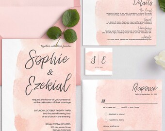 May include: A pink watercolor wedding invitation with the names Sophie & Ezekiel. The invitation details the wedding date, time, and location at the Royal Entrance Hotel in Denver, Colorado. The RSVP card is included with a pink watercolor background.