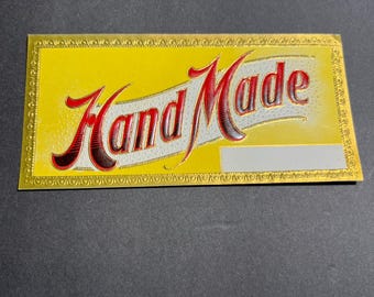 Etiqueta para puros en relieve con un hermoso borde dorado. HECHA A MANO