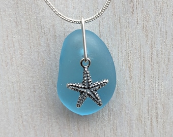 Recycled gin bottle hand made into a seaglass frosted effect pendant with sterling silver starfish