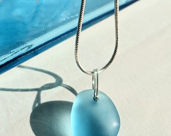 Recycled gin bottle glass pendant on a sterling silver hanger
