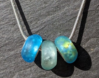 Recycled seaglass and recycled sterling silver beads inspired by the colours of the sea