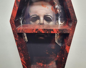 Estante de exhibición de ataúdes con temática de Michael Myers