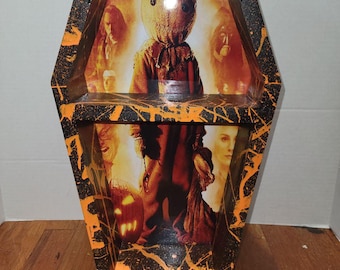 Estante expositor de ataúdes con temática de Halloween de Sam