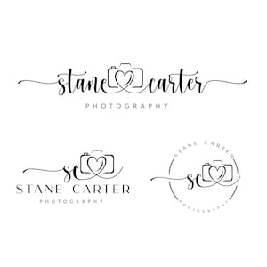 May include: Black and white logo design for a photography business called "Stane Carter Photography". The logo features a stylized camera with a heart in the lens. The name "Stane Carter" is written in a cursive font.