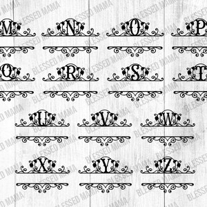 May include: A set of 26 black metal monogram initials with a decorative scroll design. Each initial is surrounded by leaves and sits on a decorative scrollwork base.
