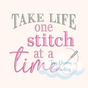 May include: A light pink and gray embroidered design on a light peach background. The text reads "TAKE LIFE one stitch at a time." A needle and thread are depicted near the words "time" and "Tiny Dreams Embroidery."