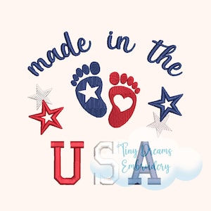 May include: Embroidered design with the text "made in the USA" and two baby footprints, one blue with a star and one red with a heart. There are also three stars, two white and one red.