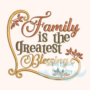 May include: Embroidered design with a heart-shaped frame and the text "Family is the greatest blessing". The design is in shades of brown, orange, and gold.
