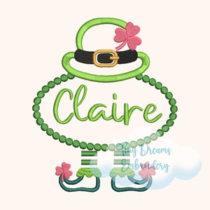 May include: Green leprechaun-themed embroidery design with a green hat, shamrock, and the name "Claire" in a green oval.