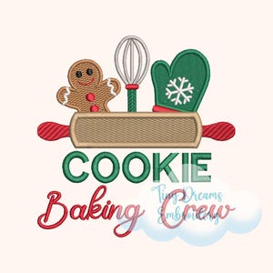 May include: An embroidered design featuring a gingerbread man, whisk, and oven mitt on a rolling pin. The word "COOKIE" is in green block letters above the word "Baking" in red script. The design is for a "Tiny Dreams Embroidery" crew.