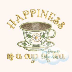 May include: Happiness is a cup of tea embroidery design featuring a gold teacup and saucer with a green floral design and a white daisy. The text is in gold.