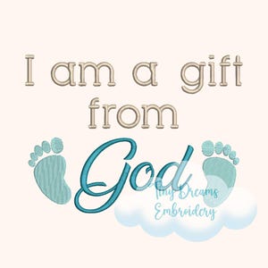 May include: Embroidered design with blue baby footprints and the text "I am a gift from God" in beige and blue.