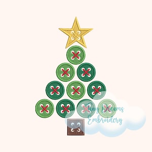 May include: A festive Christmas tree design composed of green buttons with red stitching, crowned with a gold star. A brown square button forms the base. The design is set against a light beige backdrop. Text reads "Tiny Dreams Embroidery".