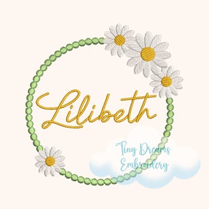 May include: A green beaded wreath with white daisies and the name "Lilibeth" in gold script. The text "Tiny Dreams Embroidery" is in a cloud below the wreath.