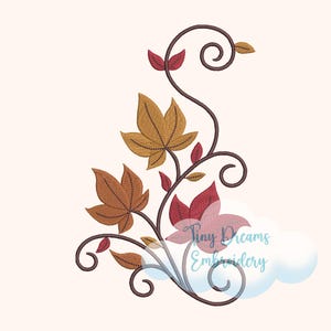 May include: An embroidered design featuring autumn leaves in shades of brown, gold, and red, with a dark brown vine. The design includes the text "Tiny Dreams Embroidery" in a cursive font.