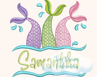 May include: Three mermaid tails with purple, green, and pink scales, with a blue wave and the name "Samantha" in a blue font.