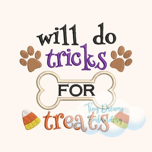 May include: Purple text that reads "will do tricks for treats" with a bone shape around the word "for". There are two brown paw prints on either side of the word "tricks" and a yellow and orange candy corn on the right side of the text.