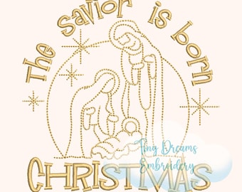 May include: Gold embroidered design featuring the text "The Savior is Born" and "CHRISTMAS". The design depicts a nativity scene with Mary, Joseph, and baby Jesus, surrounded by stars. The Tiny Dreams Embroidery logo is also visible.
