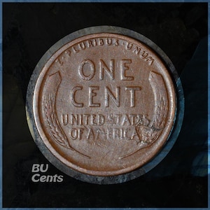 May include: A close-up of a copper United States one-cent coin. The coin features the words "ONE CENT" in large letters, with "UNITED STATES OF AMERICA" below. The coin is surrounded by a dark border and the text "BU Cents" is in the lower left corner.