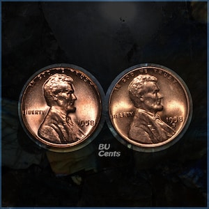 May include: Two copper-colored 1958 Lincoln pennies. Each coin features a profile of Abraham Lincoln, the word "LIBERTY," and the year "1958." The text "IN GOD WE TRUST" is visible on the top of each coin. The text "BU Cents" is also visible.